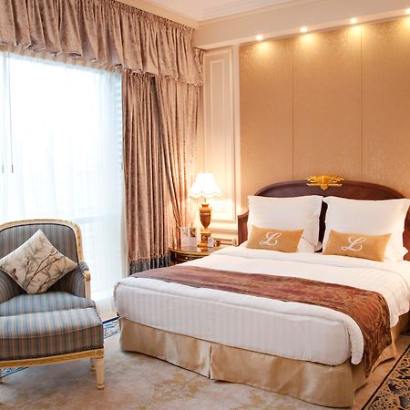New Orient Landmark Hotel Macau Exterior foto A bedroom at the hotel